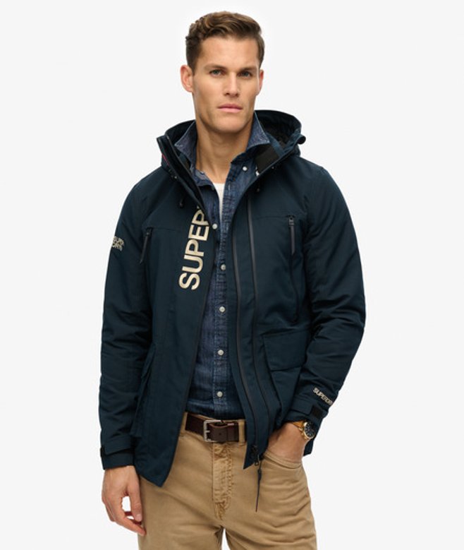 Capuchon Ultimate Geborduurde Windbreaker Blauw Grootte: S afbeelding