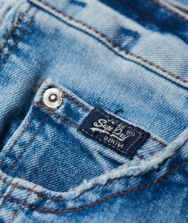 Jean large taille mi-haute troué aux genoux