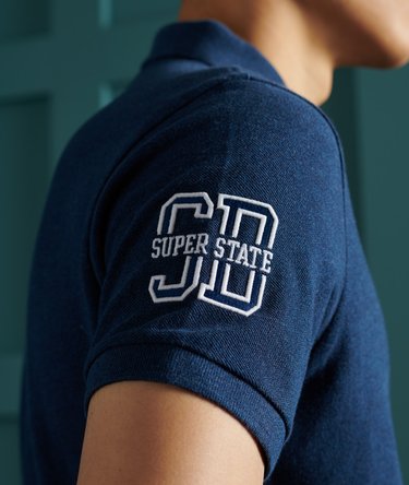 Polo classica in cotone biologico con applicazioni Image 4