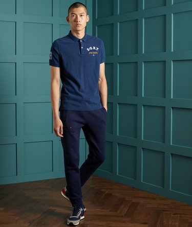 Polo classica in cotone biologico con applicazioni Image 2