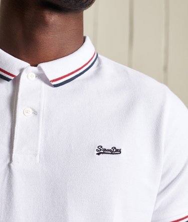 Polo van biologisch katoen met korte mouwen en contrasterende strepen Image 7