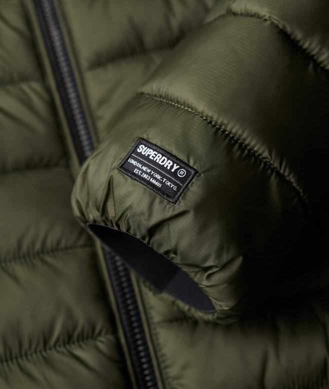 Hombre Chaqueta acolchada con capucha Fuji Sport en verde musgo