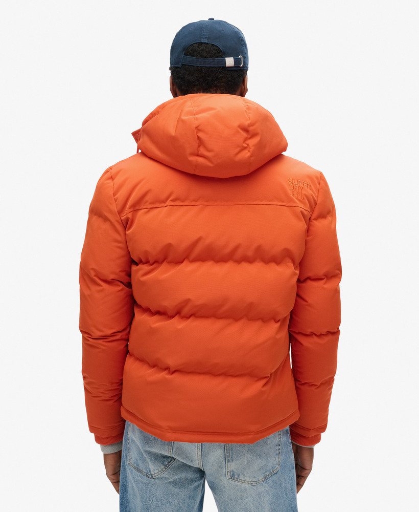mens Everest Short Hooded Puffer Jacket in Pureed Pumpkin Orange