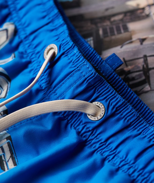 Photographic 17-inch Recycled Swim Shorts More Colours Available Price £22.49 Price reduced from £44.99 to You Save 50%