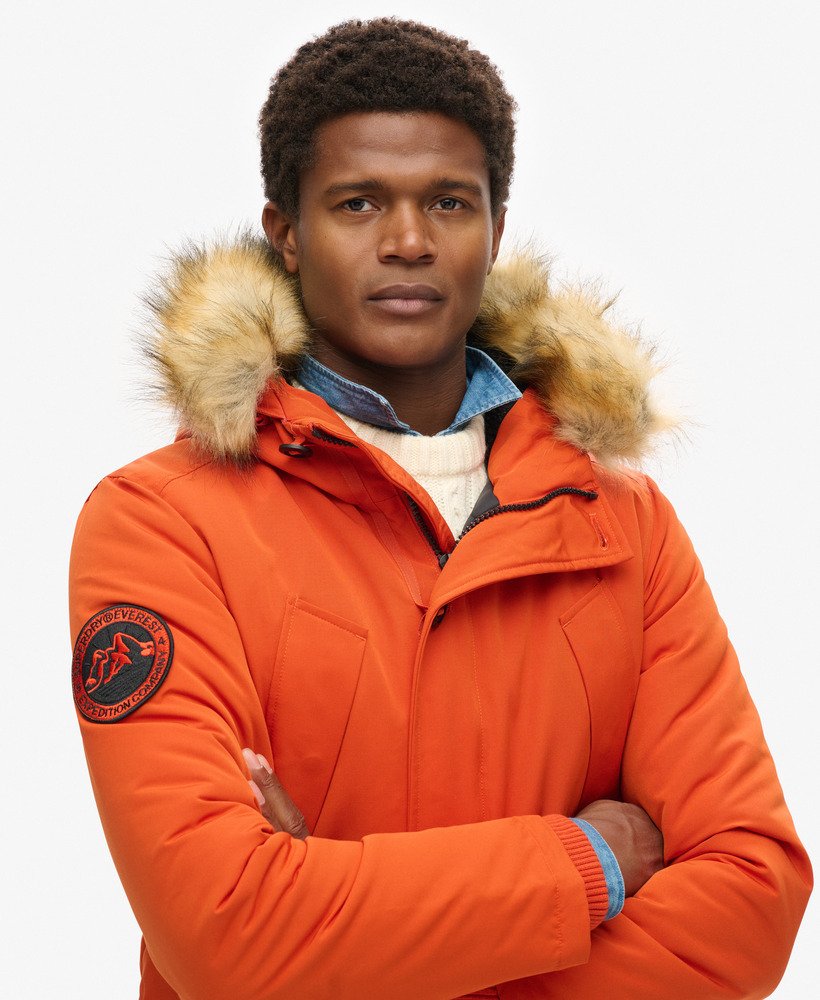 mens Everest Faux Fur Hooded Parka Coat in Pureed Pumpkin Orange