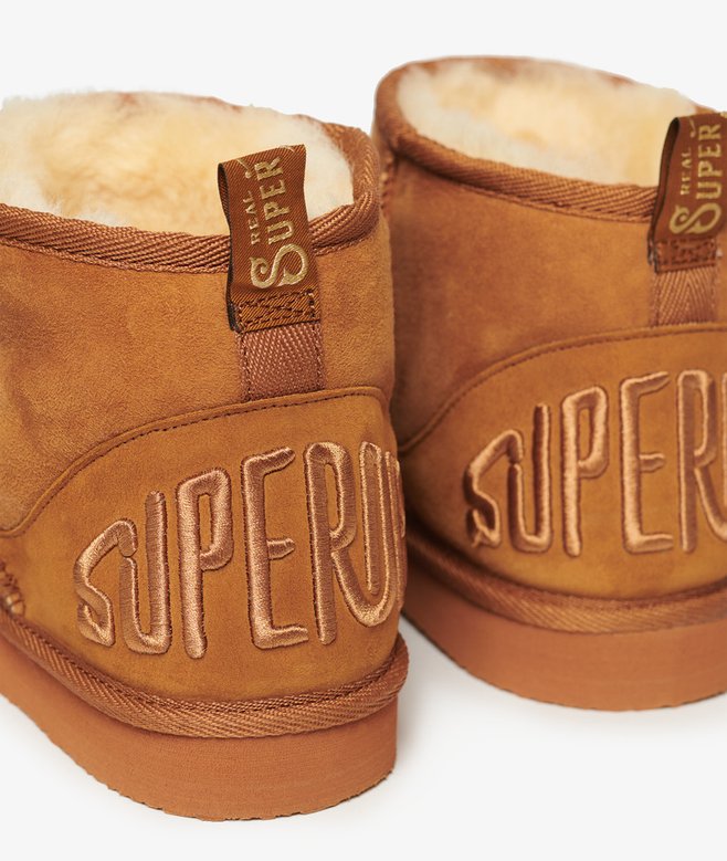 Suede Sherpa Mini Boots More Colours Available Price £62.99 Price reduced from £89.99 to You Save 30%