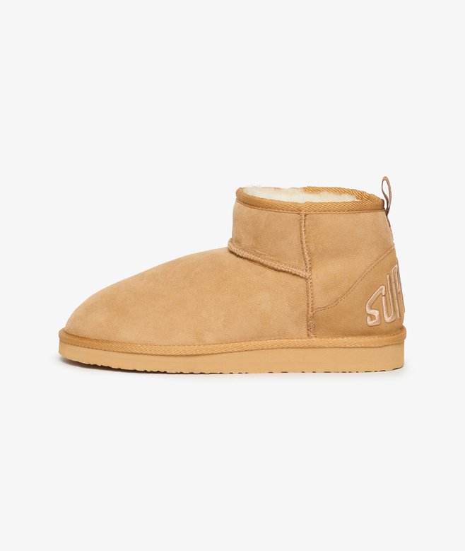 Suede Sherpa Mini Boots More Colours Available Price £62.99 Price reduced from £89.99 to You Save 30%