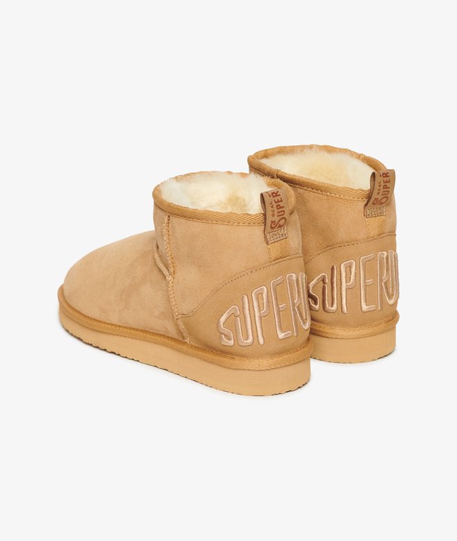 Suede Sherpa Mini Boots More Colours Available Price £62.99 Price reduced from £89.99 to You Save 30%