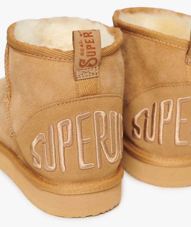 Suede Sherpa Mini Boots More Colours Available Price £62.99 Price reduced from £89.99 to You Save 30%