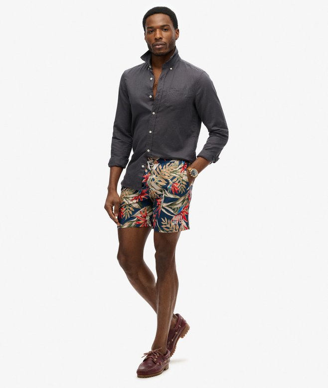 Hawaiian Print 16-Inch Swim Shorts More Colours Available Price £19.99 Price reduced from £39.99 to You Save 50%