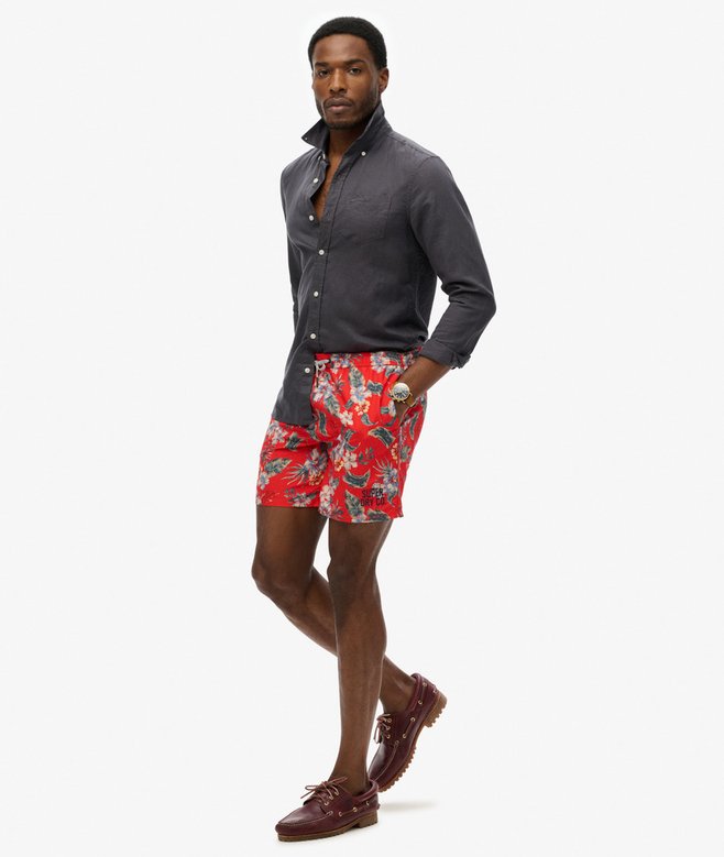 Hawaiian Print 16-Inch Swim Shorts More Colours Available Price £19.99 Price reduced from £39.99 to You Save 50%