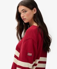 Maglione oversize a righe con scollo a V