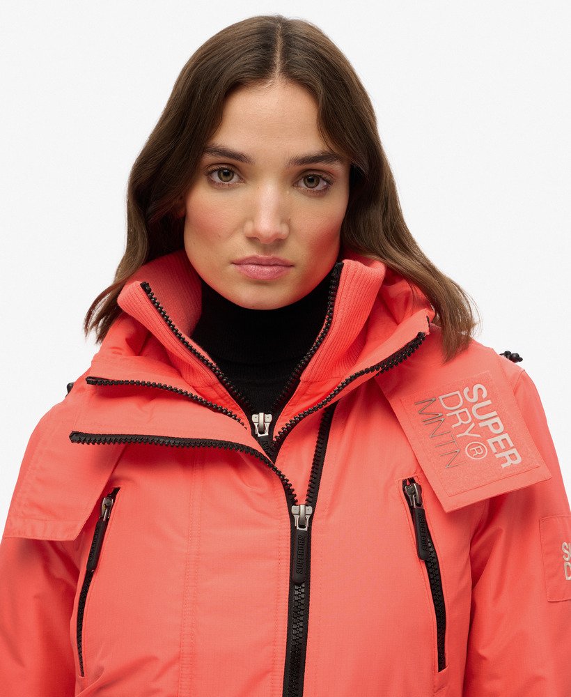 womens Hooded Mountain Windbreaker Jacket in Hyper Fire Coral