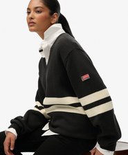 Maglione oversize a righe con scollo a V
