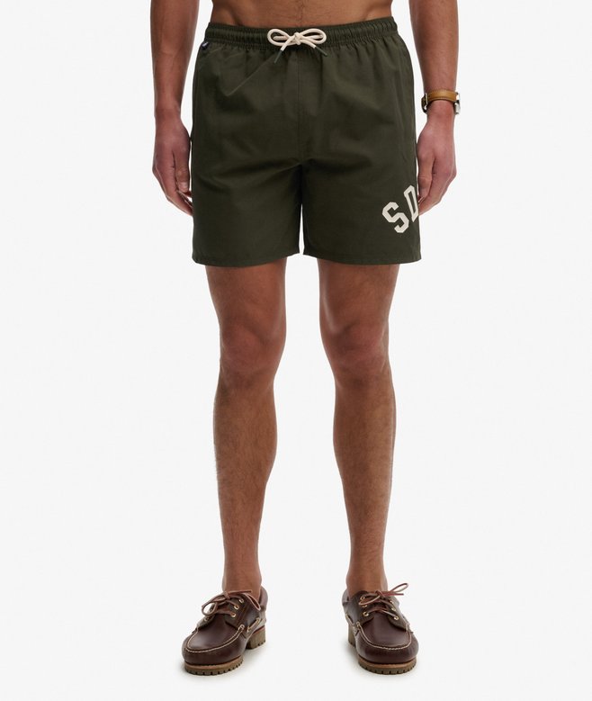 Printed Logo 16-Inch Swim Shorts More Colours Available Price £24.49 Price reduced from £34.99 to You Save 30%