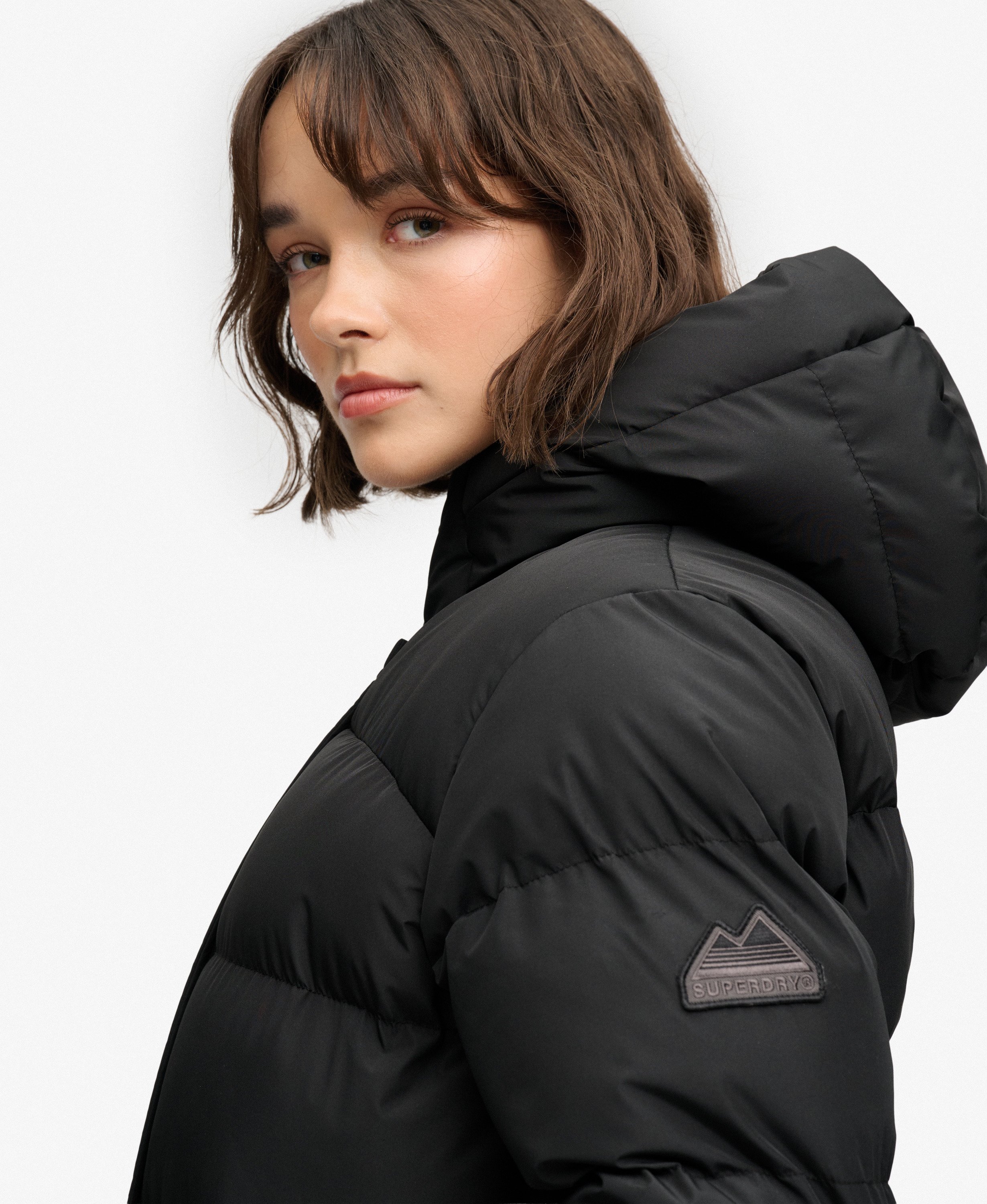 womens Hooded Sports Puffer Mid Length Jacket in Black | Superdry US